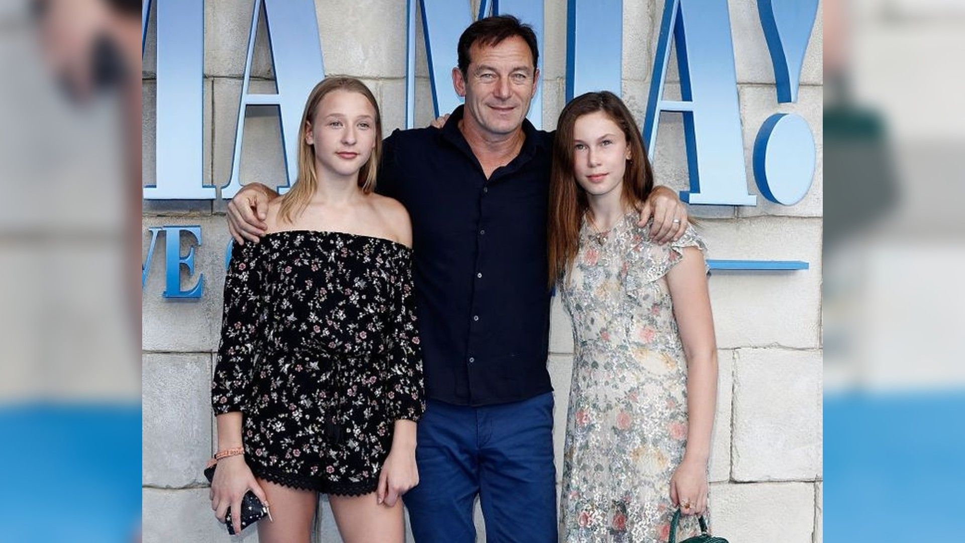 Jason Iscaacs and his daughters