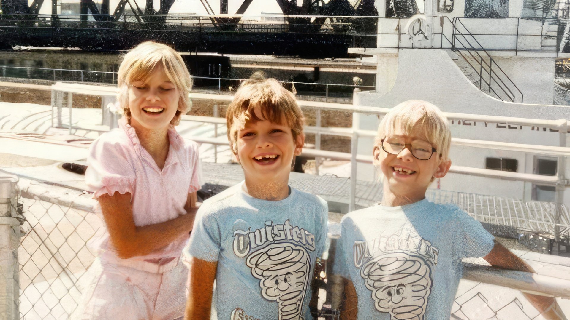 Ashton Kutcher with his brother and sister in their childhood