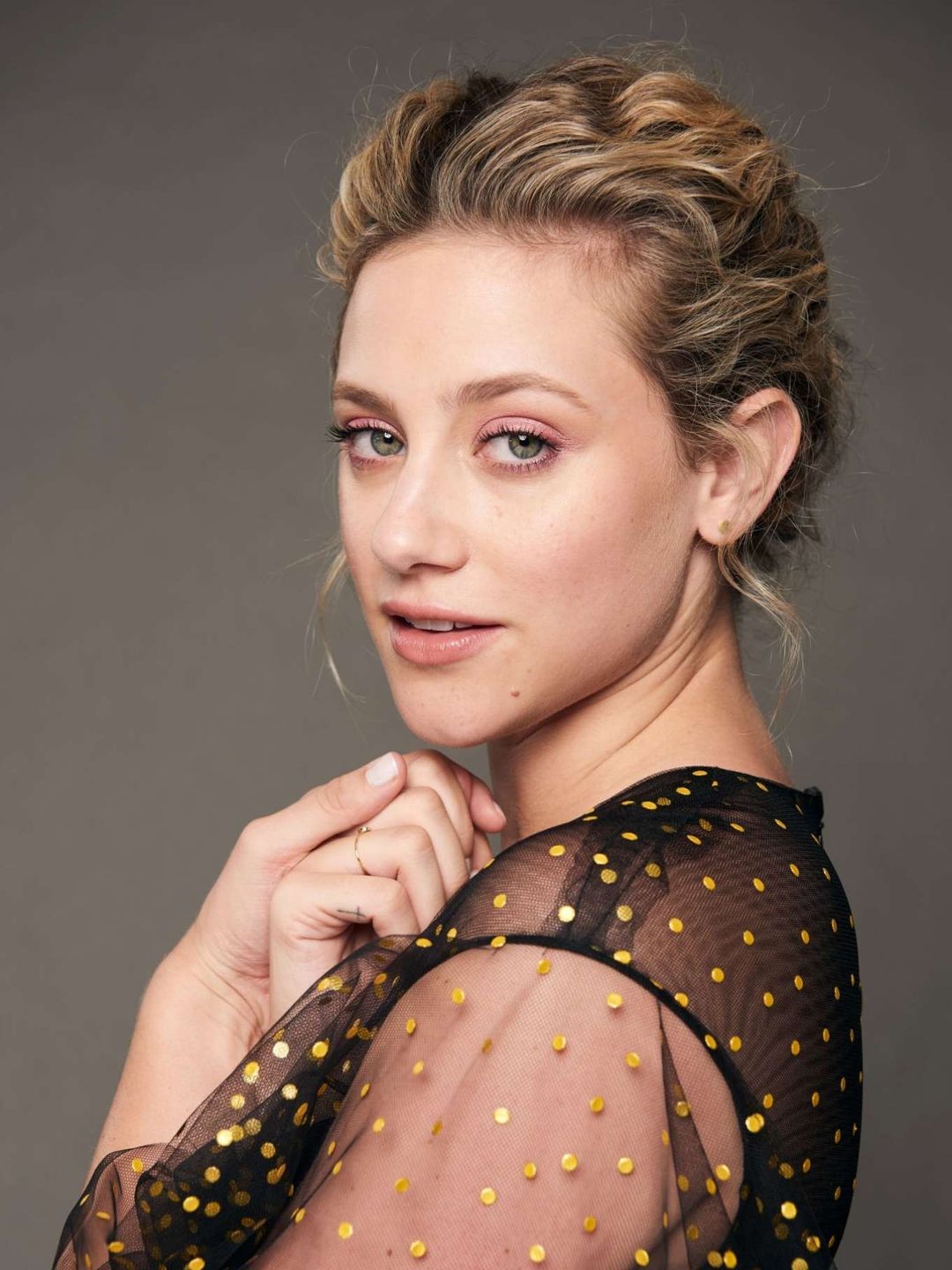 Lili Reinhart who is her father