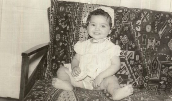 Mila Kunis in childhood