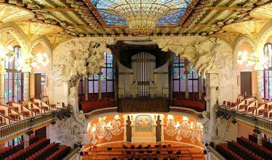 The Palace of Catalan Music is lit with the sun
