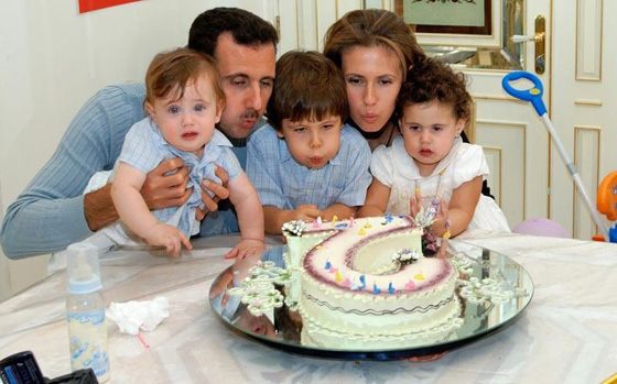 Bashar Al-Assad with his wife and children Bashar Al-Assad with his wife and children