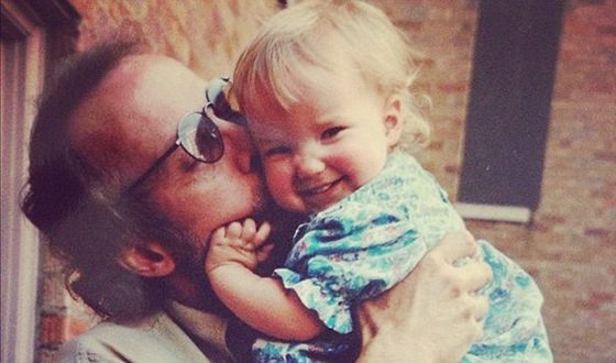 Dove Cameron as a child with her father