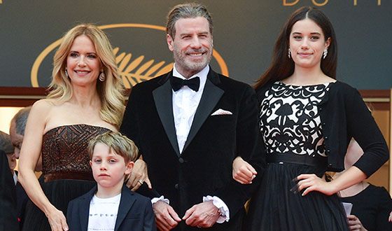 John Travolta, his wife, daughter and son