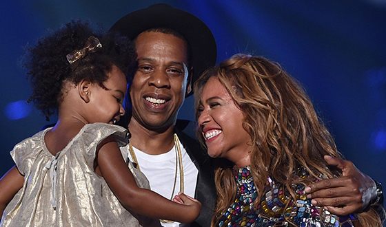 Jay-Z with wife and daughter