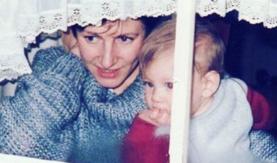 Tom Hopper as a child with his mother