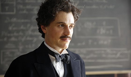 Johnny Flynn portraying Albert Einstein