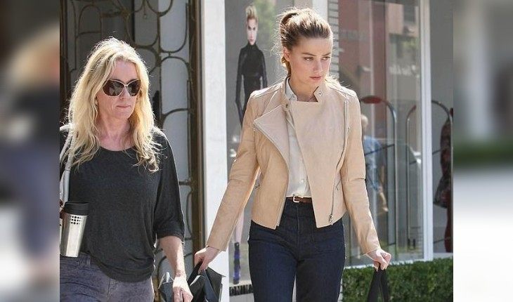 Amber Heard with her assistant Kate James