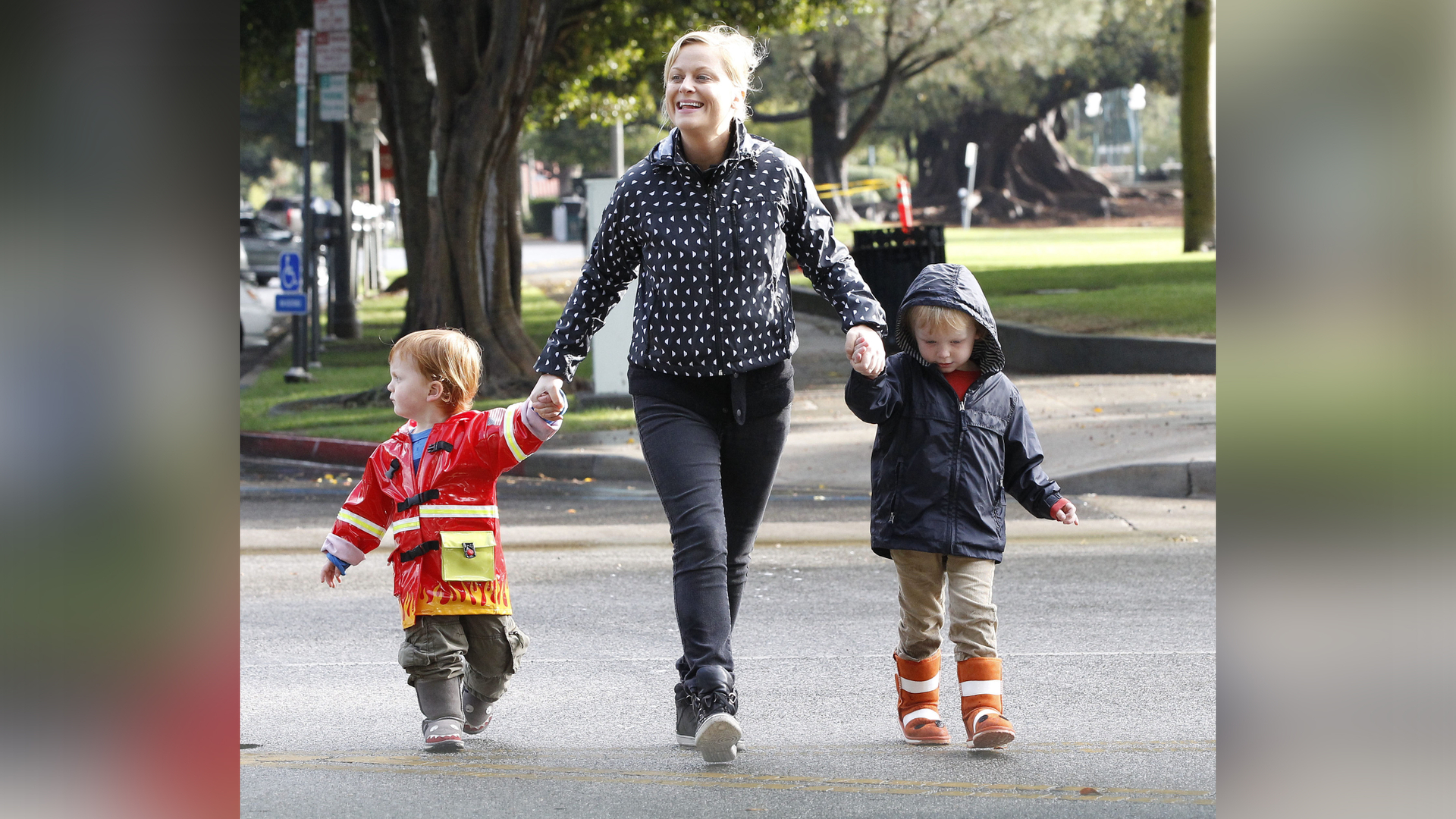 Amy Poehler with her children on a walk