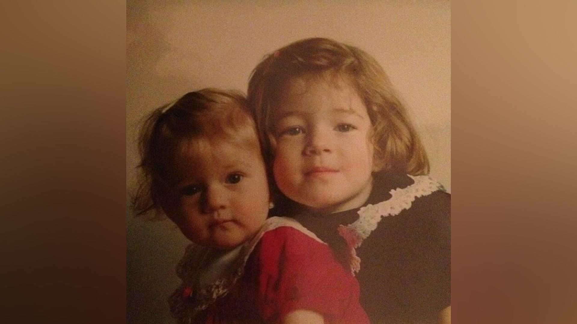 Julia Garner and her sister in childhood