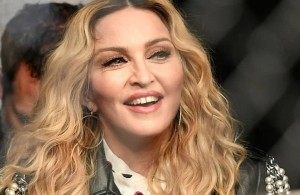 Changed her image: 64-year-old Madonna painted pink