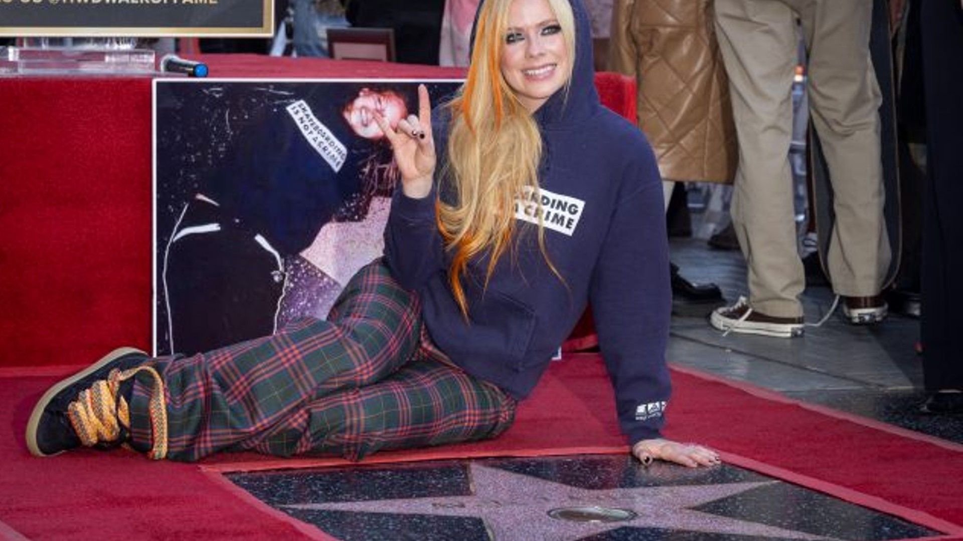 Avril Lavigne with her star