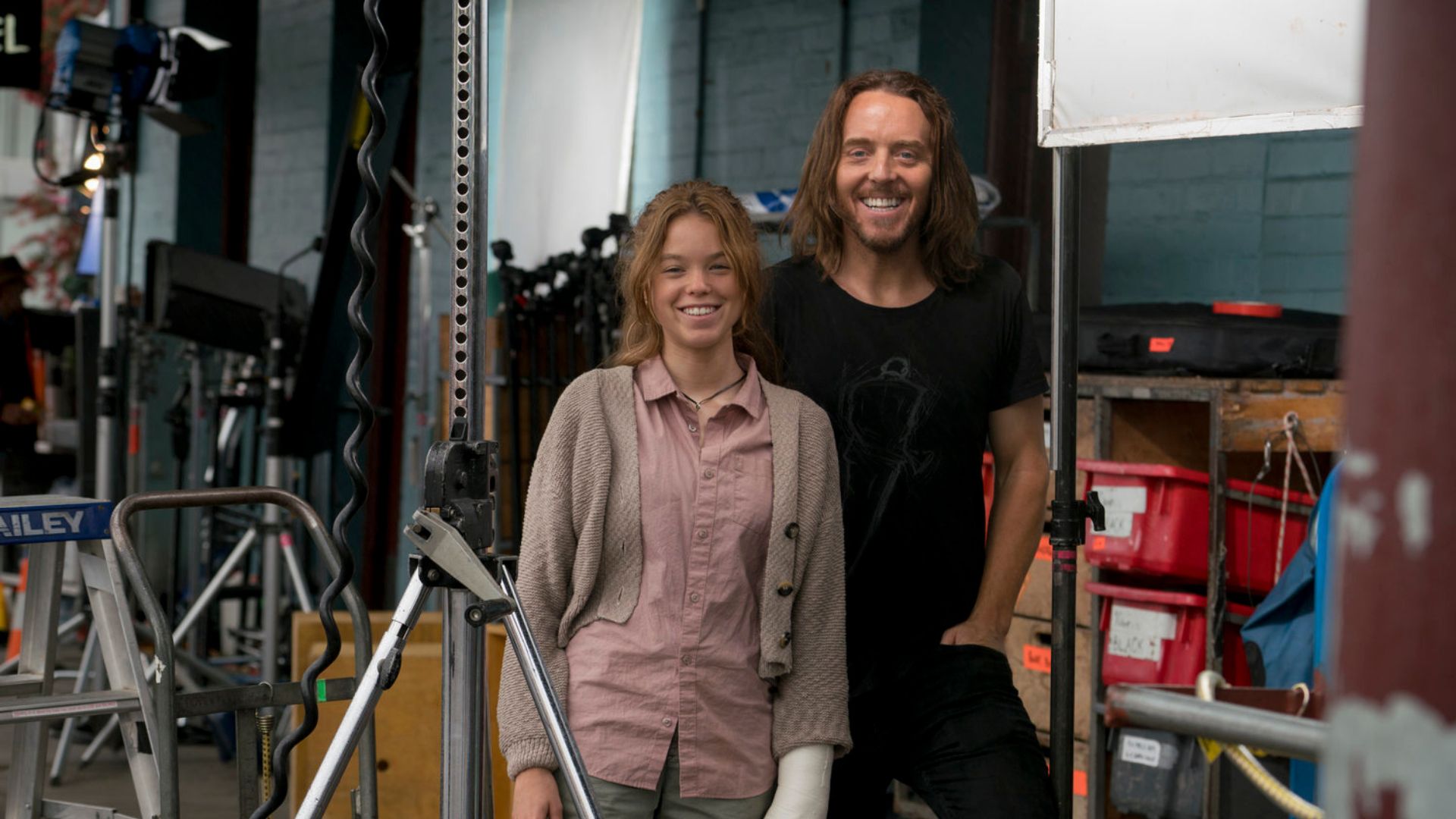 Milly Alcock and Tim Minchin on the set of The Piano
