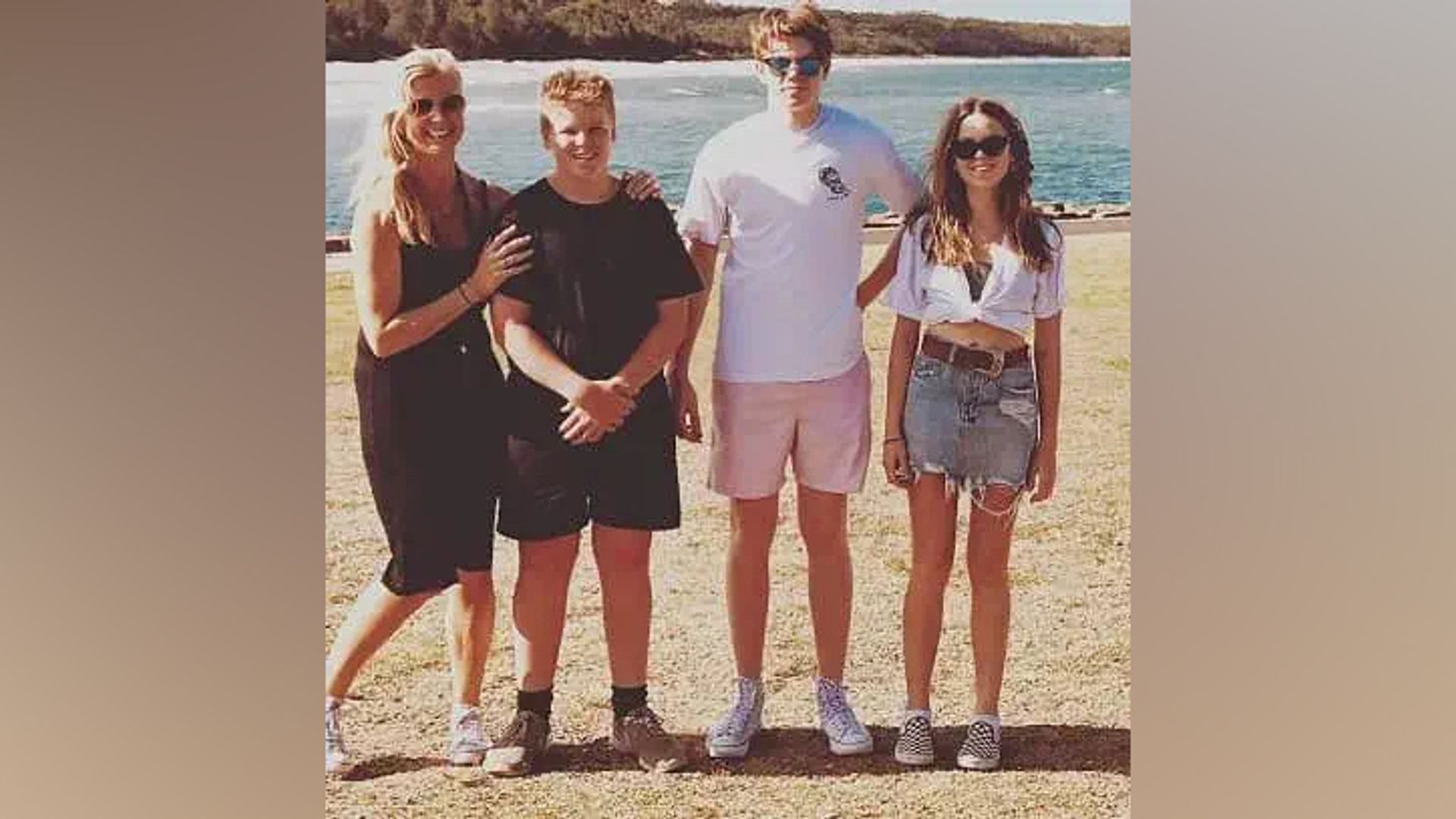 Milly Alcock with her mother and brothers