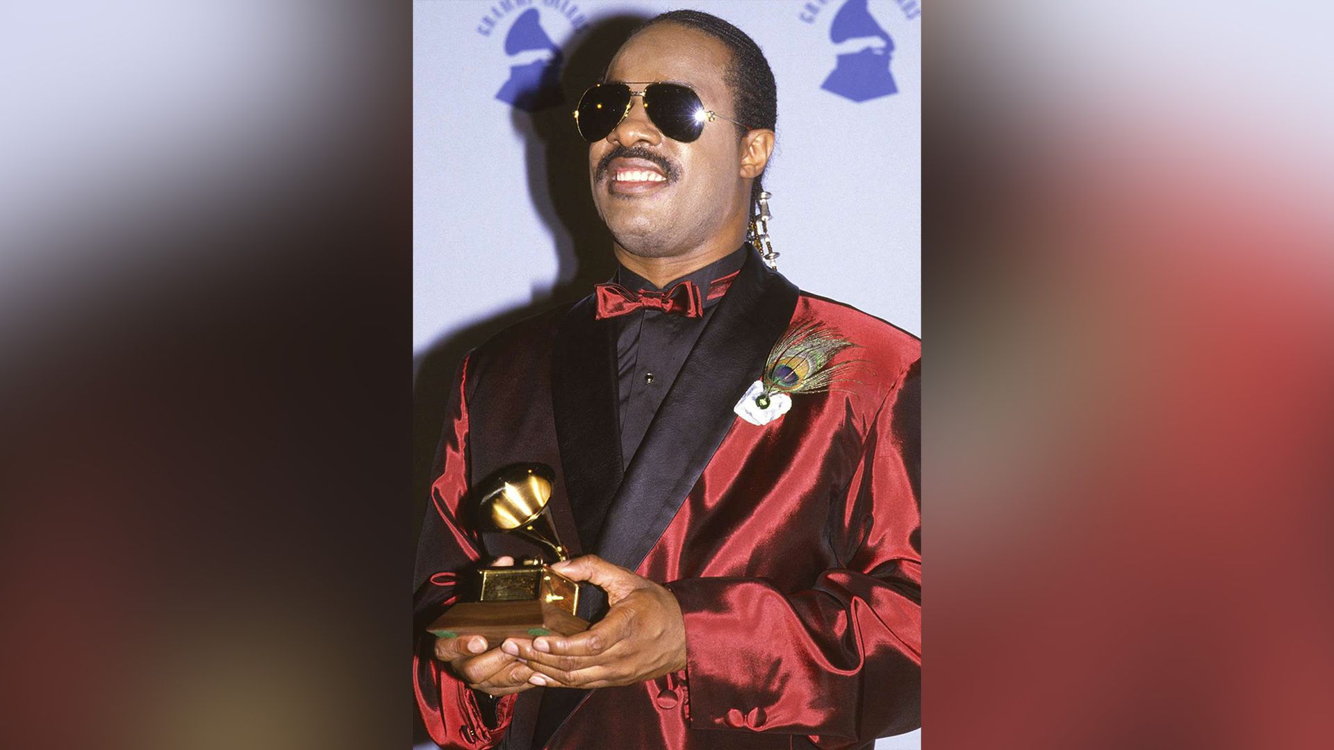 Stevie Wonder with a Grammy Statuette