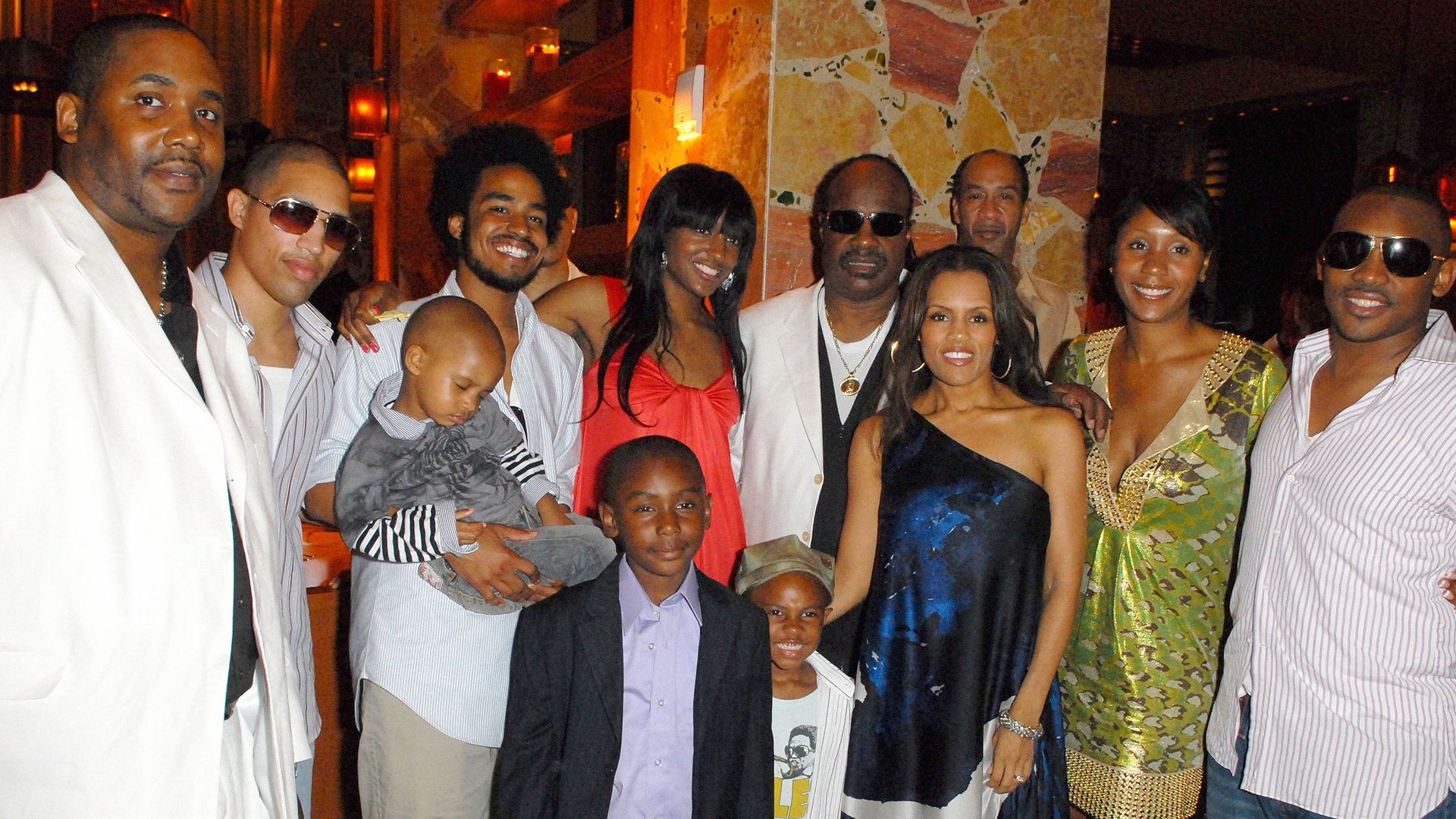 Stevie Wonder with his children and grandchildren