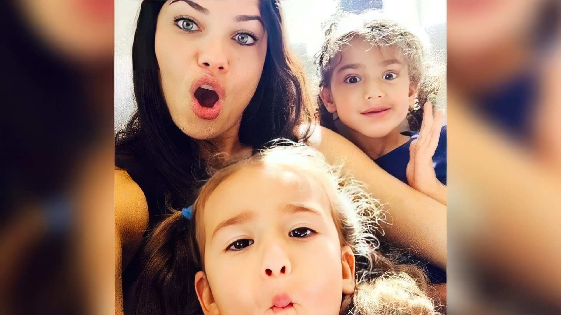 Adriana Lima with her children