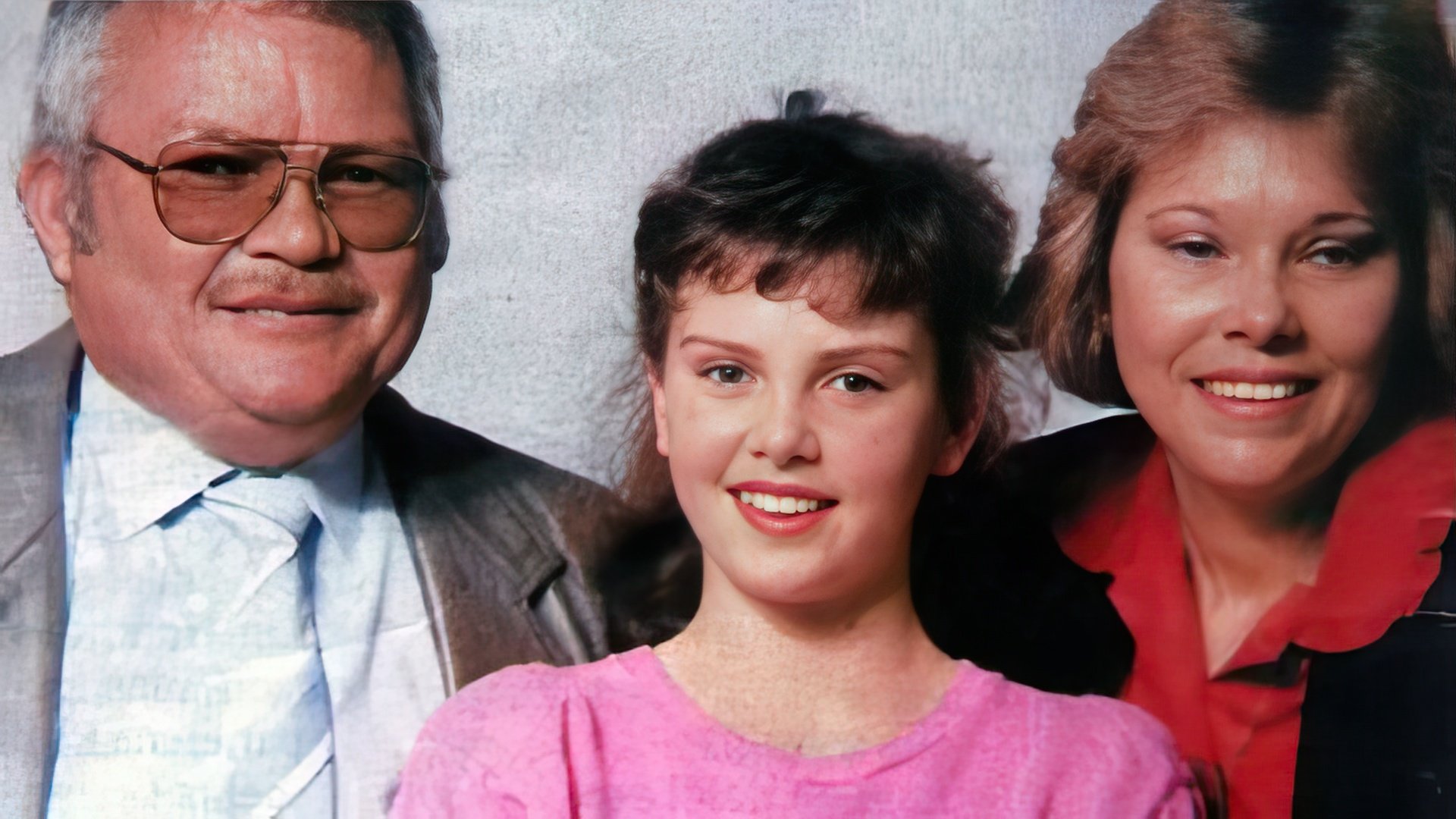 Young Charlize Theron with her parents