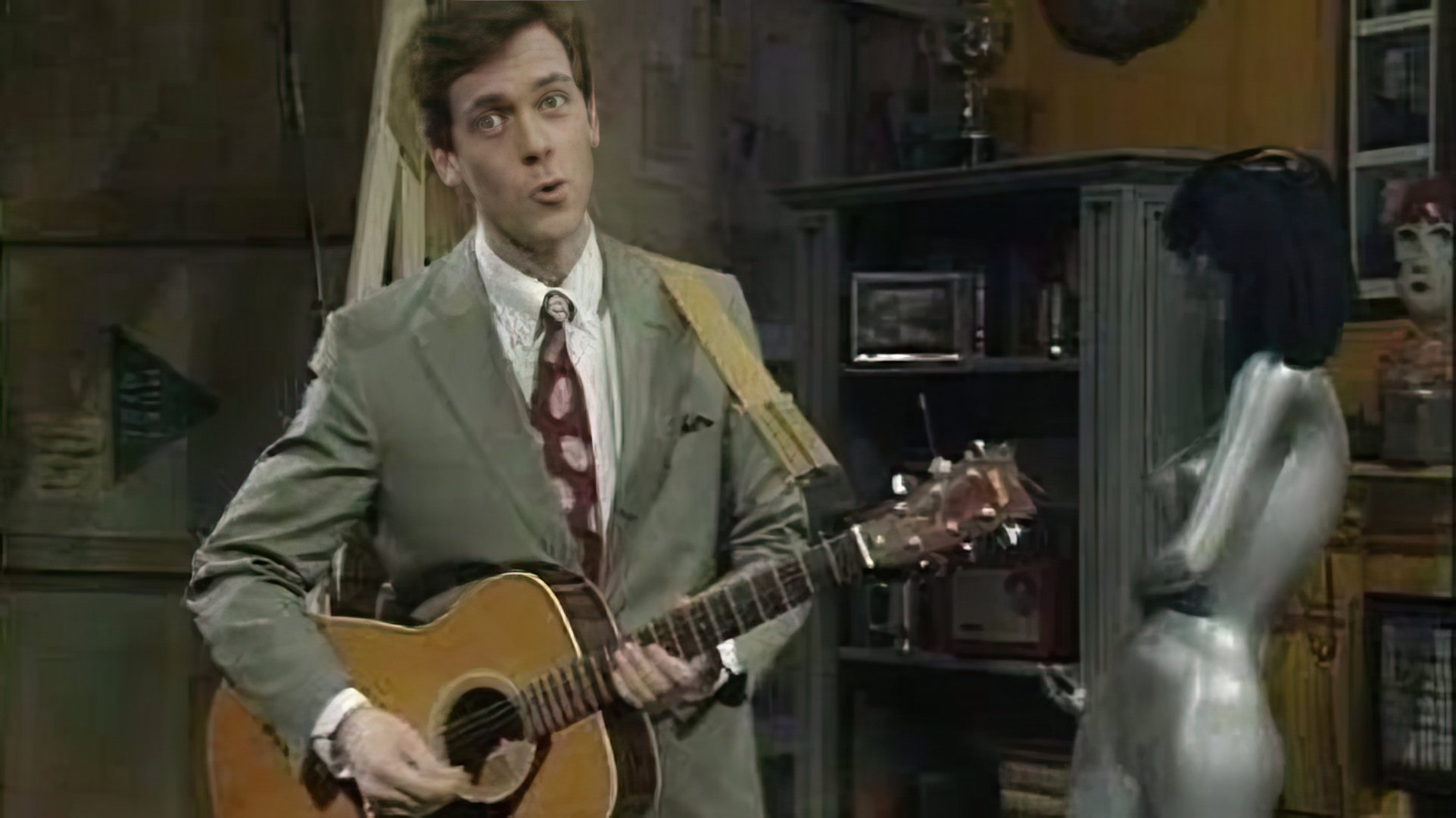 Hugh Laurie plays the guitar, piano, and harmonica excellently