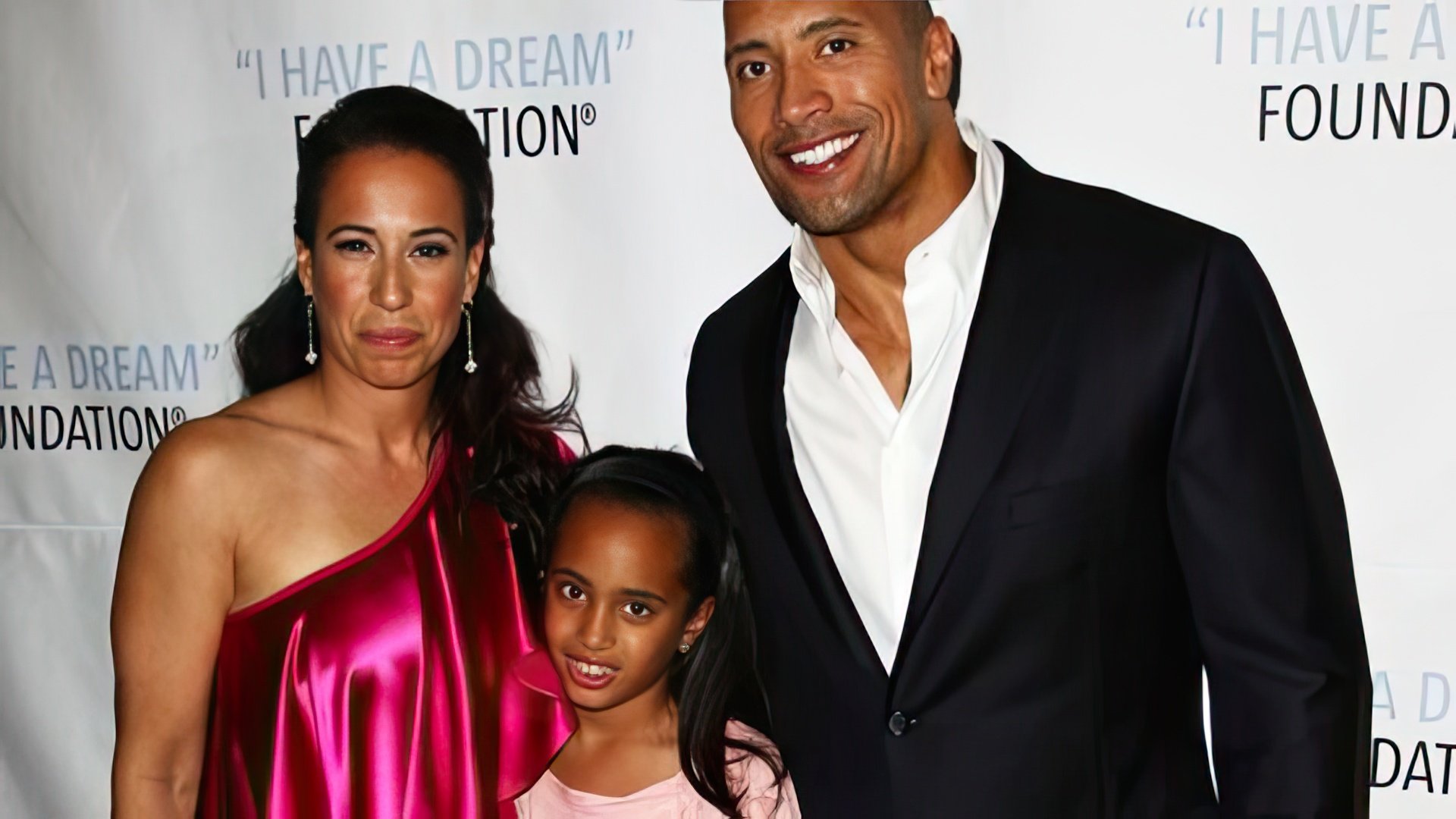 Dwayne Johnson with his first wife and daughter