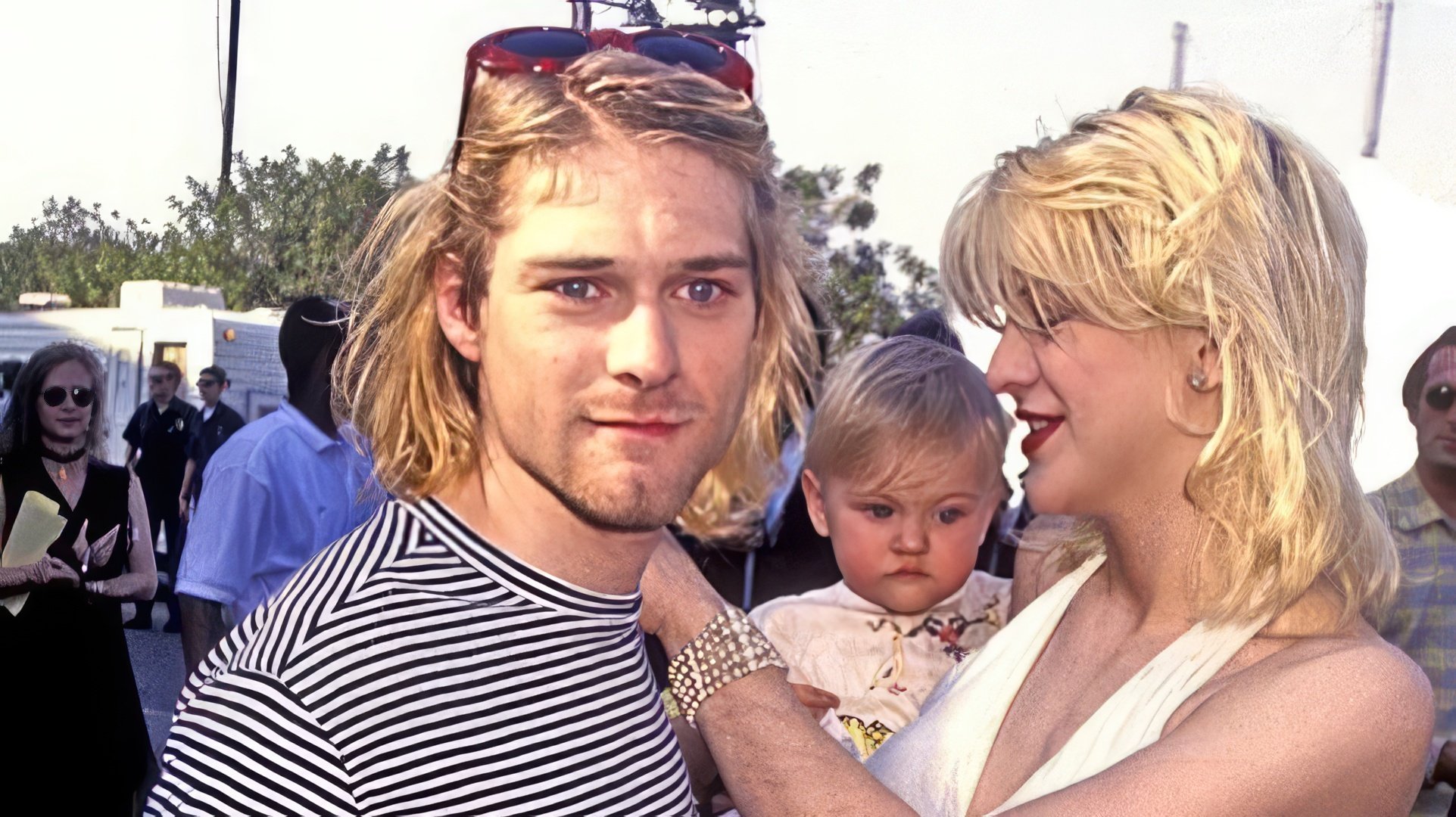 Courtney Love with her husband and daughter