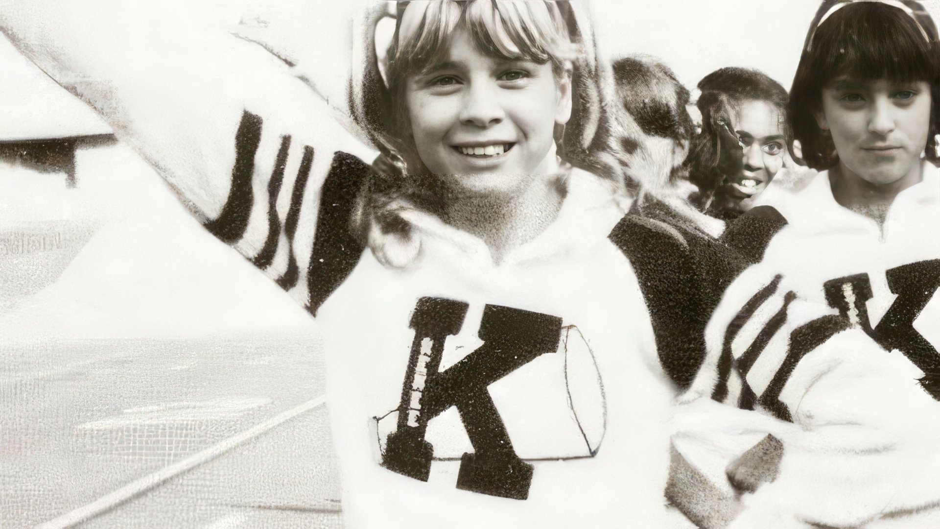 School photo of Renee Zellweger in the cheerleading squad