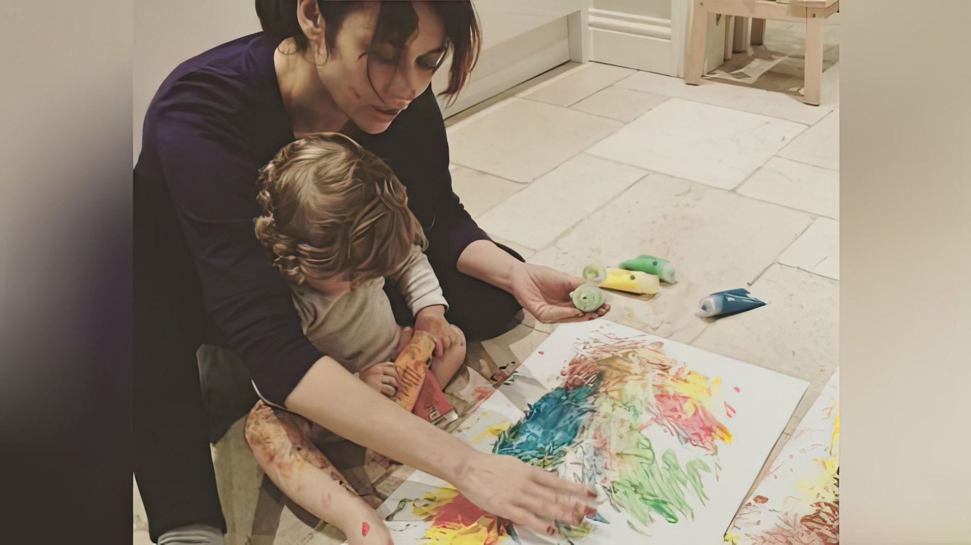 Olga Kurylenko doesn't show her son's face