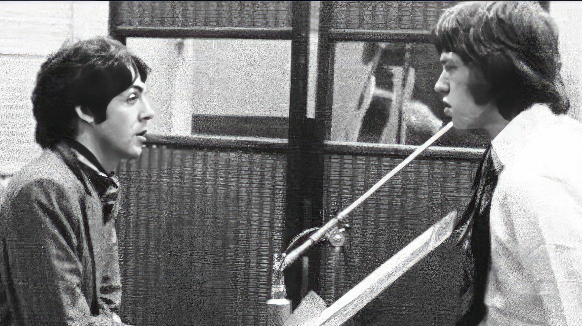 Paul McCartney and Mick Jagger at a recording session (1967)