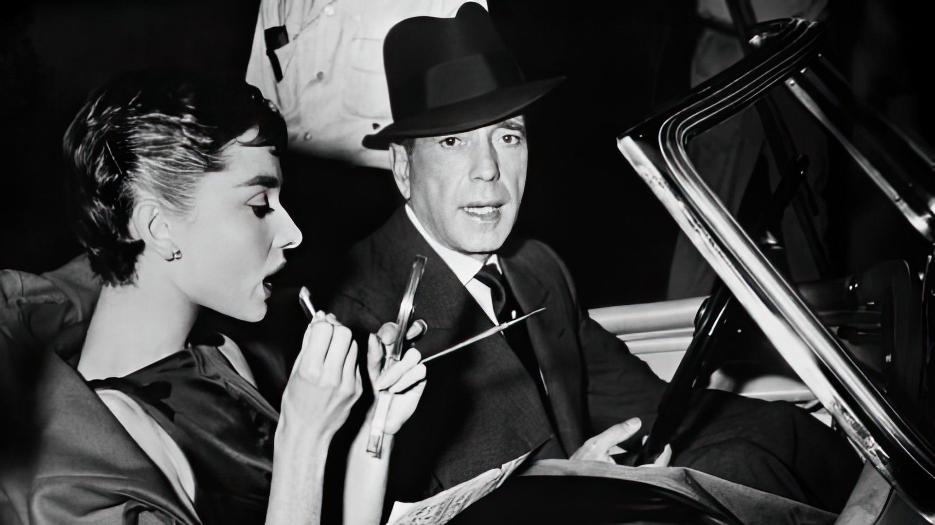 Audrey Hepburn and Humphrey Bogart on the set of 'Sabrina'