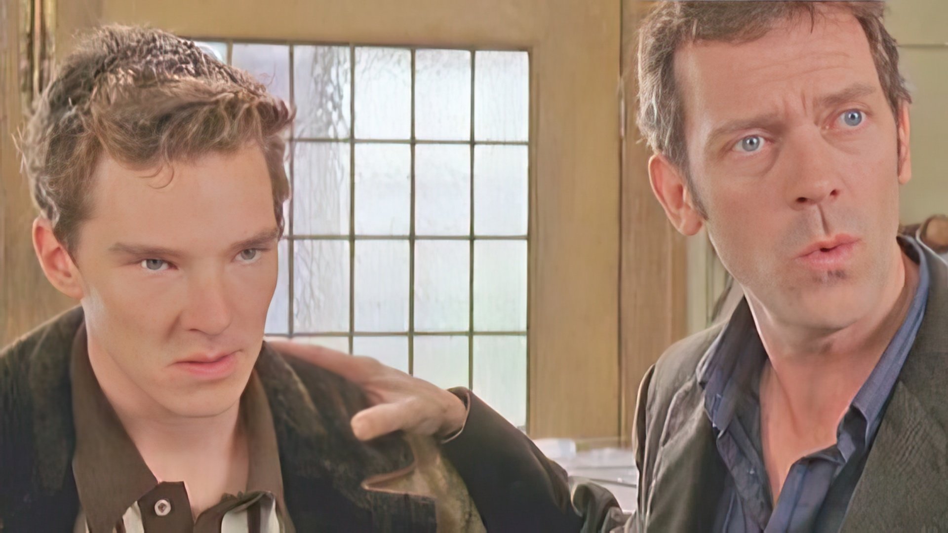 Young Benedict Cumberbatch playing Hugh Laurie's son