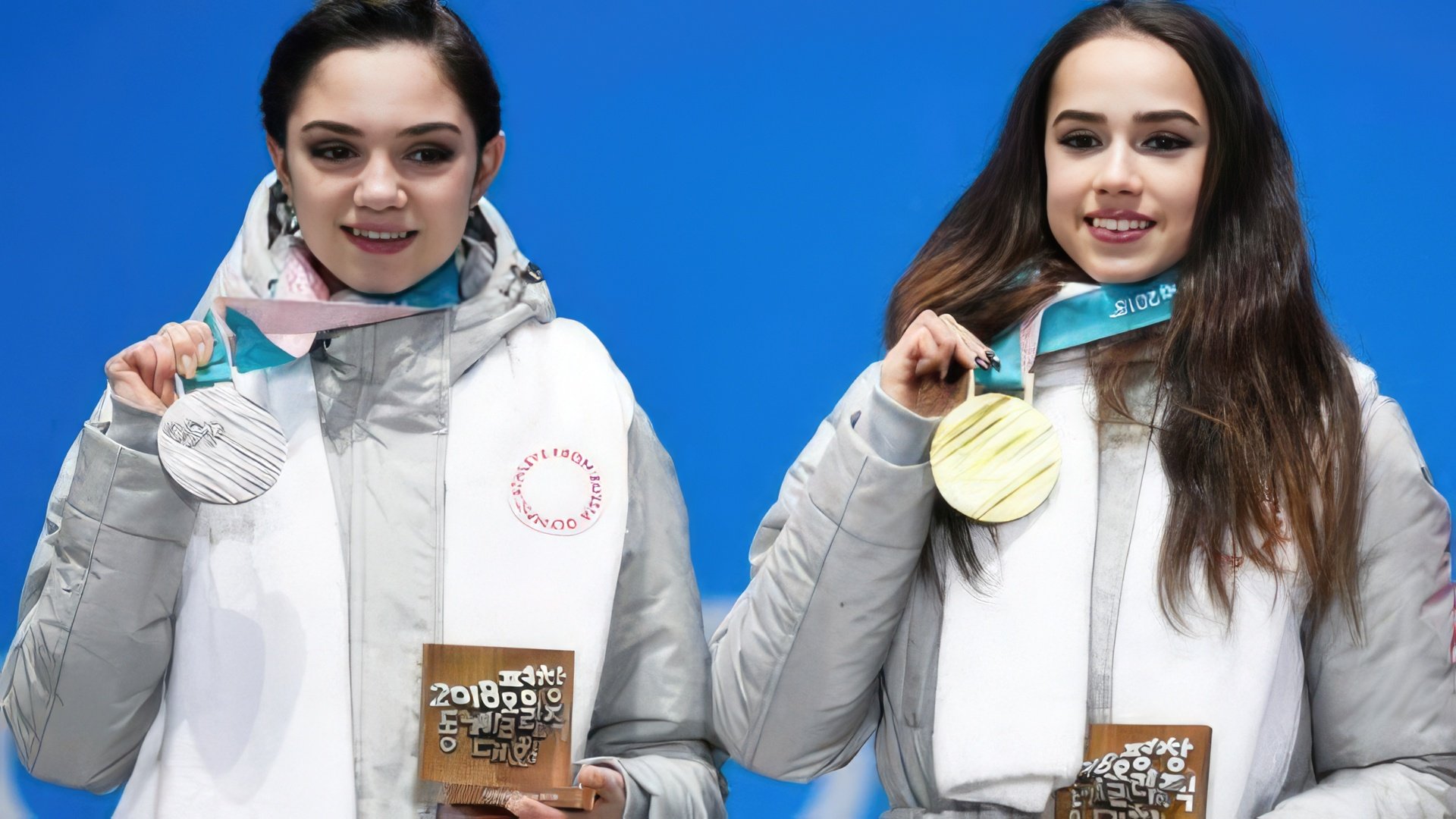 Evgenia Medvedeva and Alina Zagitova at the 2018 Olympics medal ceremony