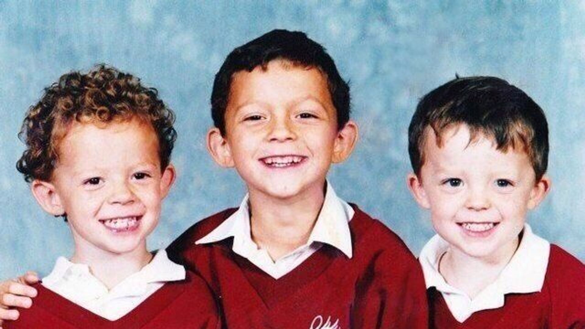 Tom Holland in childhood (center)