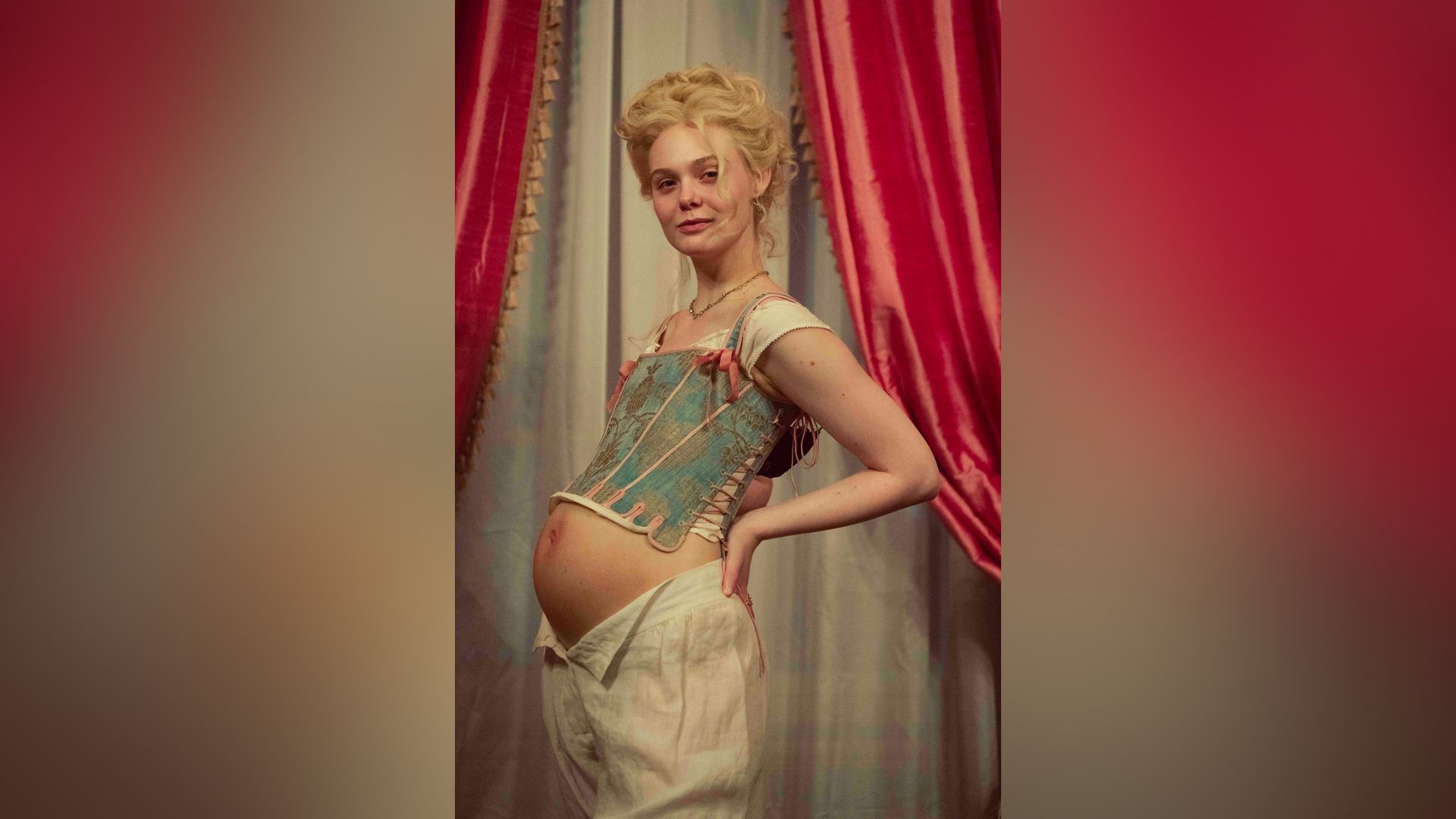 Elle Fanning with a false belly