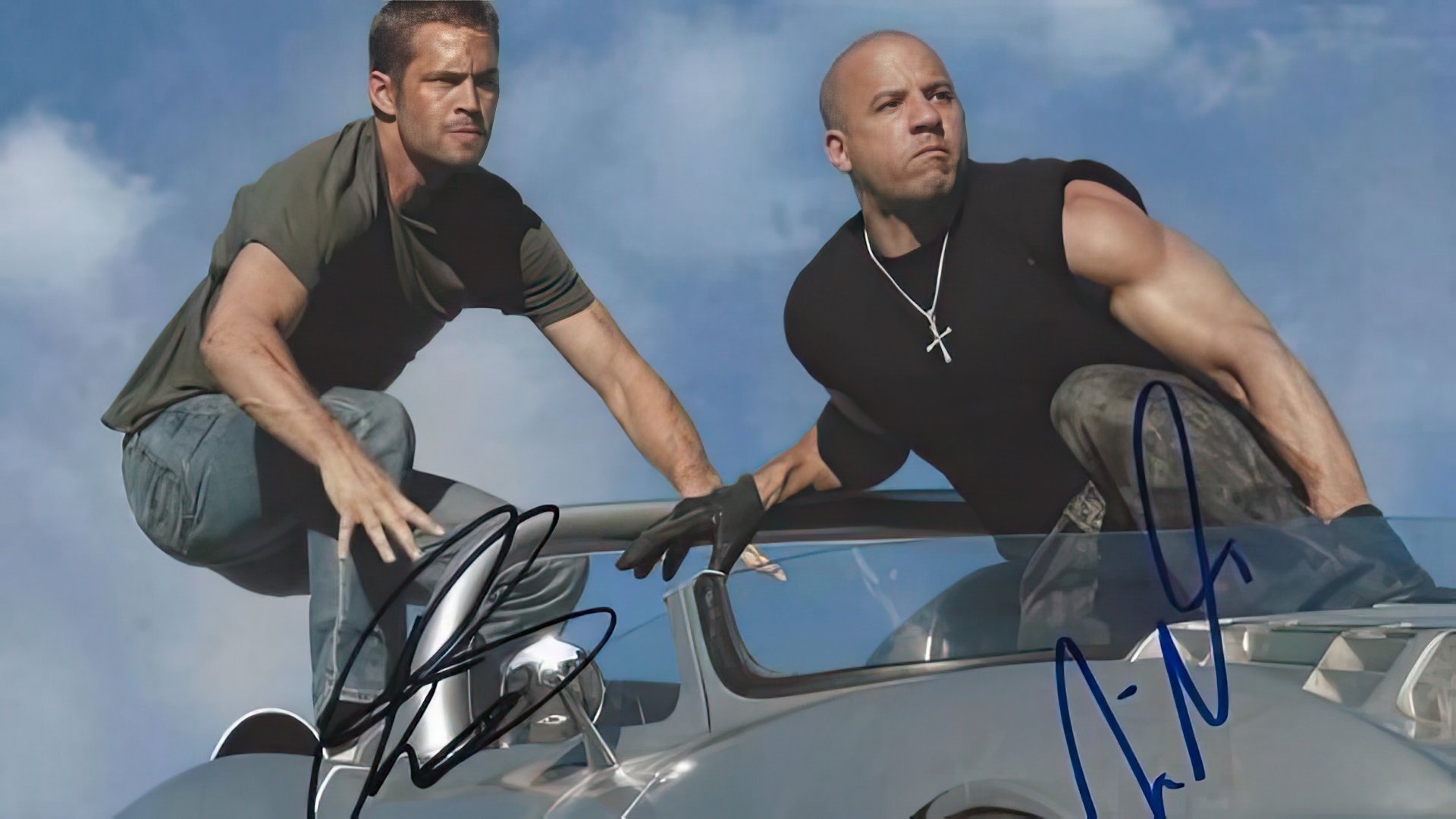 A picture from filming «The Fast and The Furious» autographed by Vin Diesel and Paul Walker