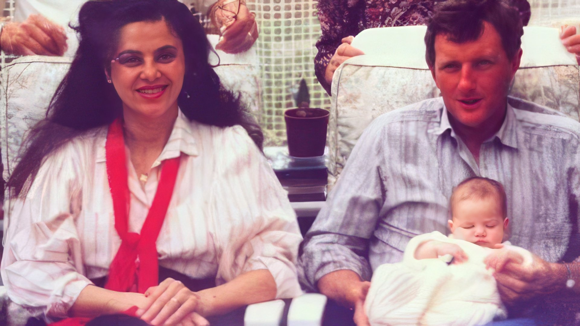 Very young Kaya Scodelario with her parents