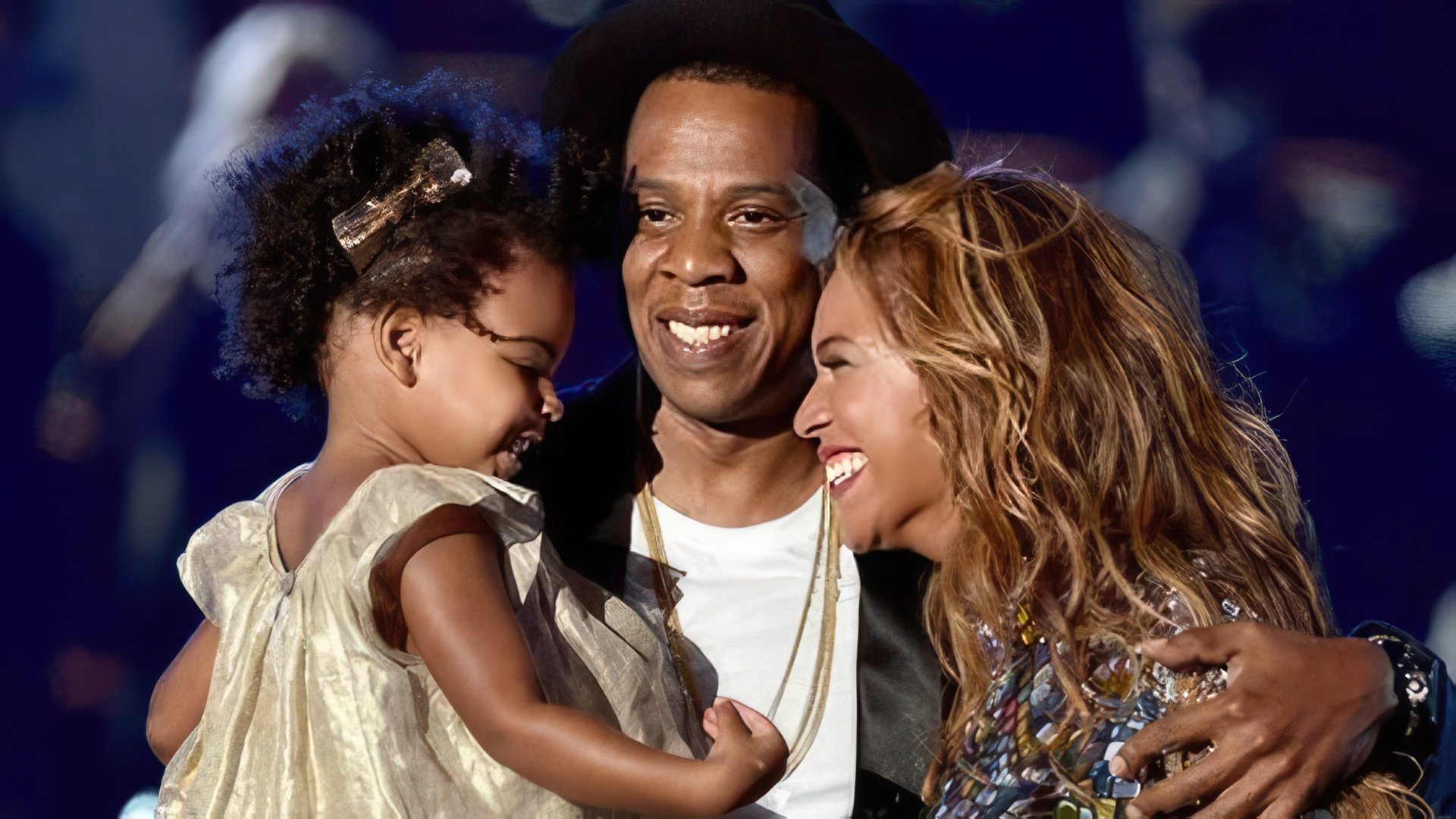 Beyoncé with her husband and daughter