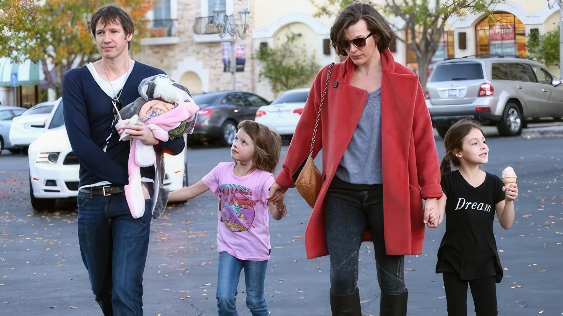 Milla Jovovich with Paul Anderson and children