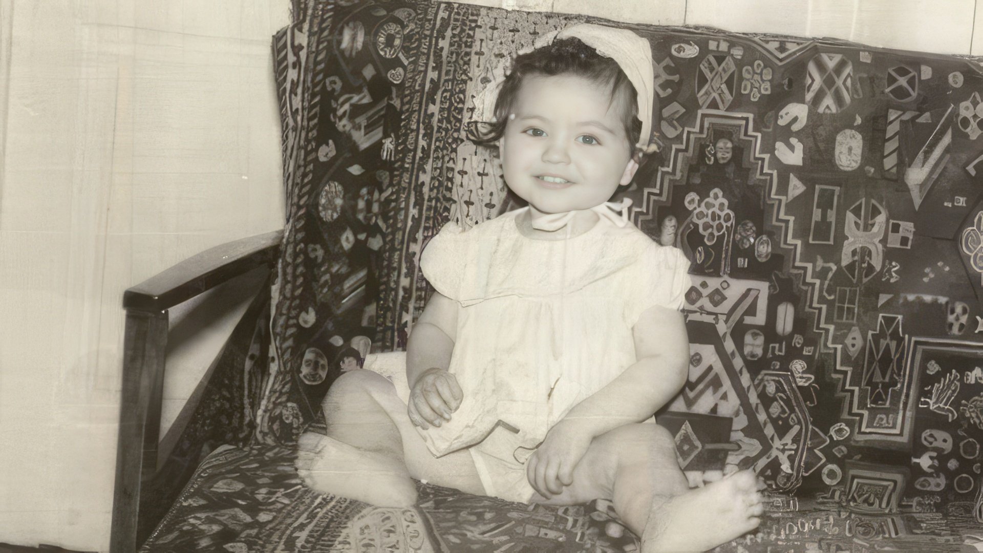 Mila Kunis in childhood