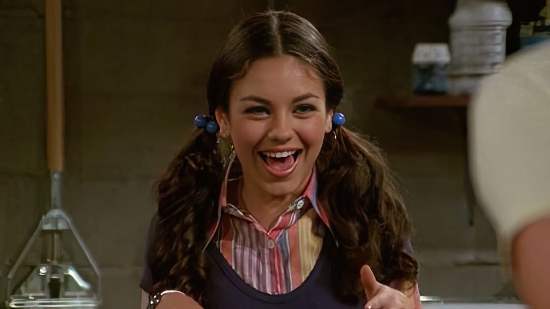 Mila Kunis playing Jackie Burkhart