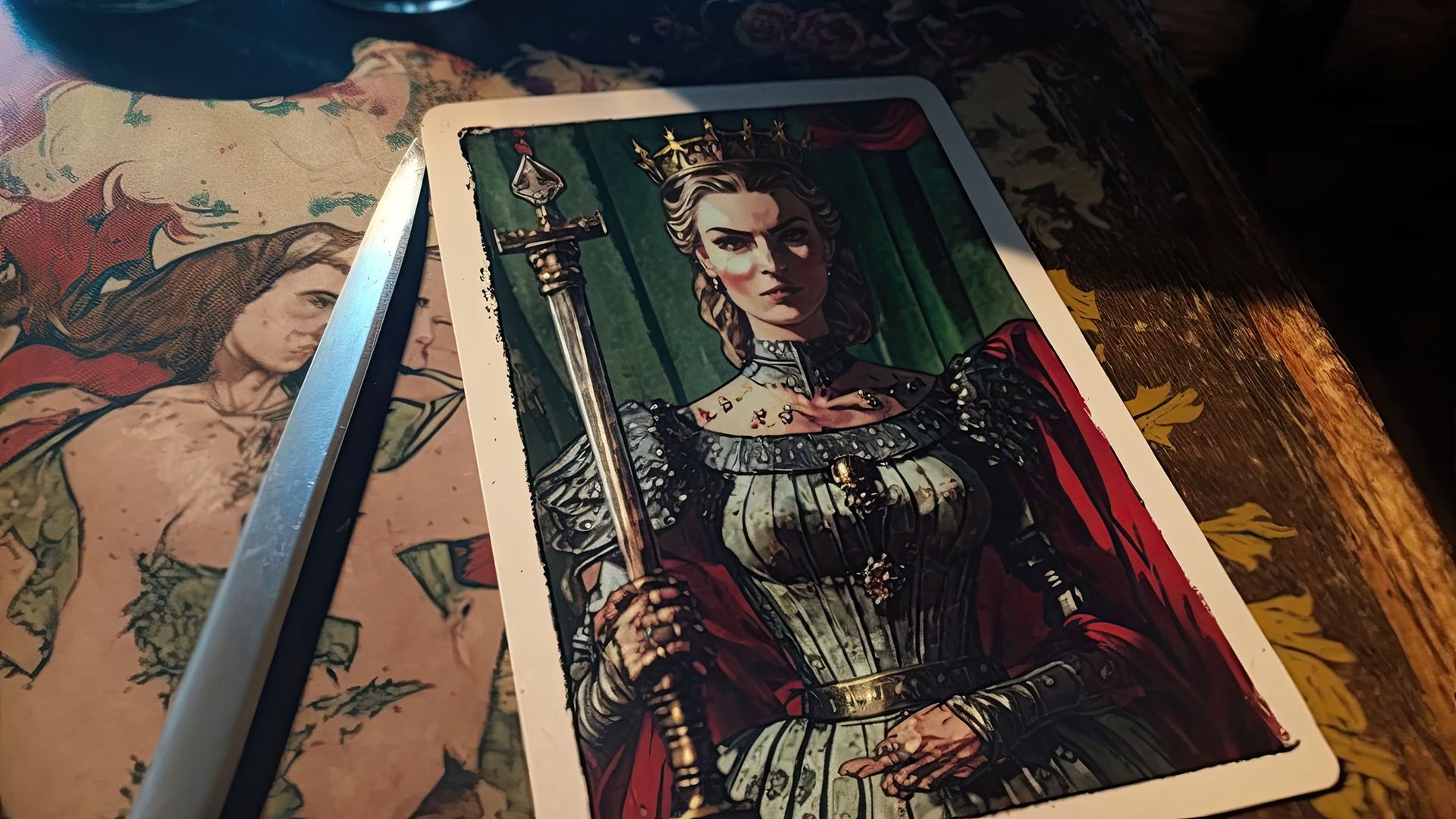 The Queen of Swords symbolizes independence and readiness to fight