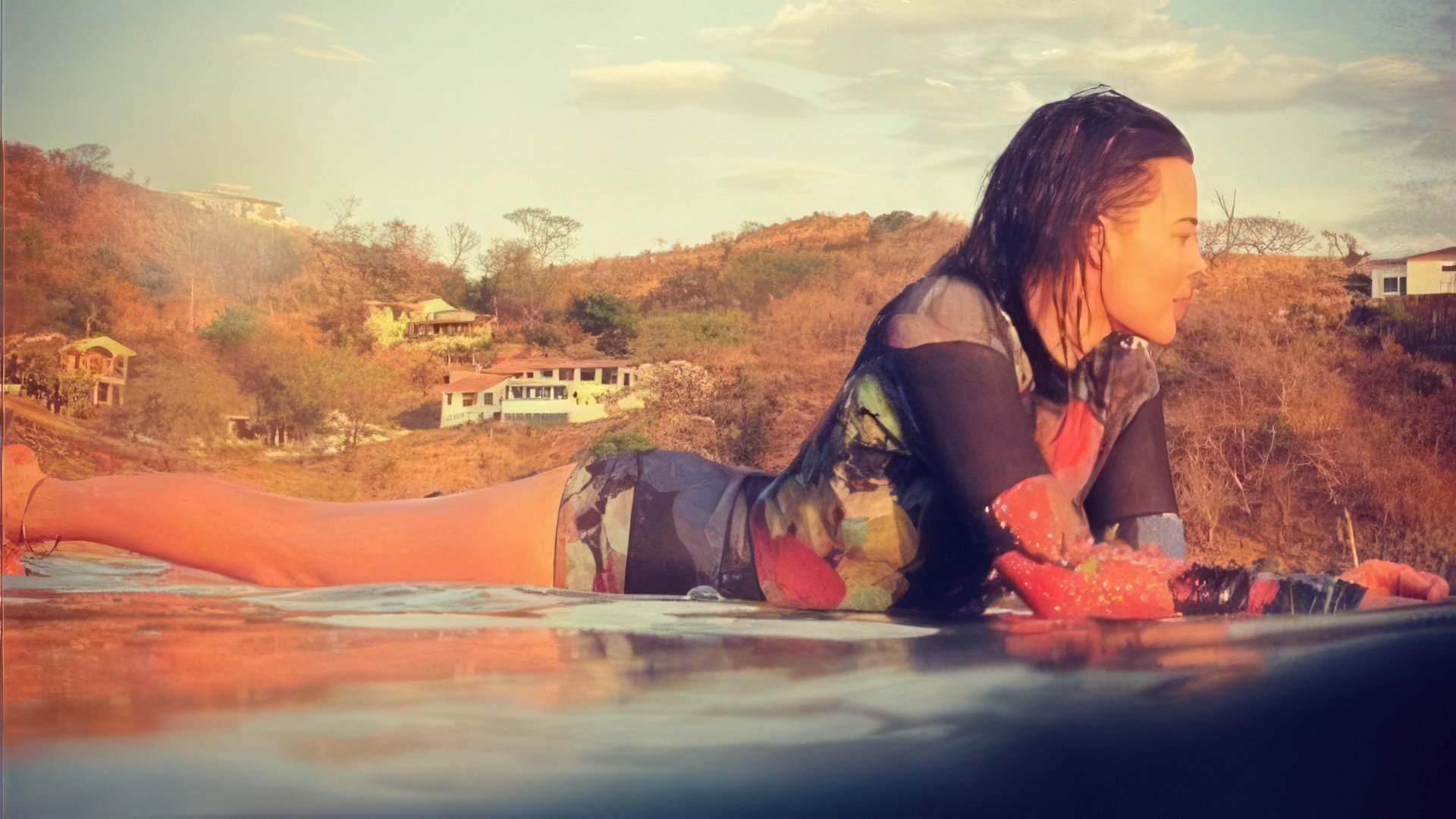 As a true Australian, Margot Robbie loves surfing