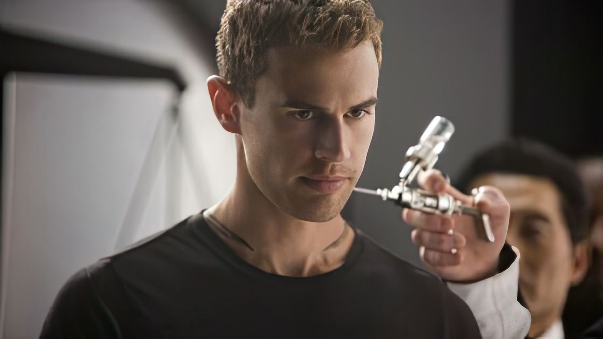 Theo James as Tobias Eaton, Divergent Instructor