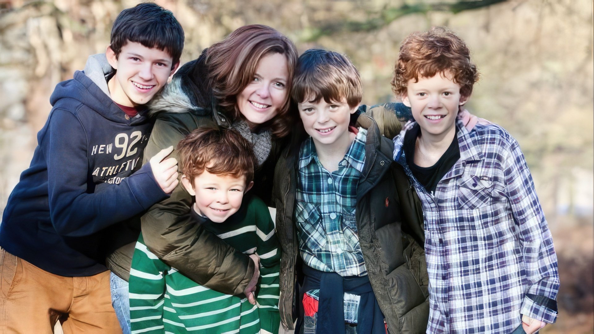 Tom Holland with his brothers and mother