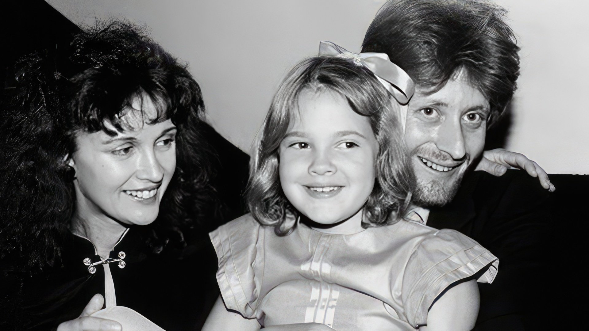 Drew Barrymore with her parents