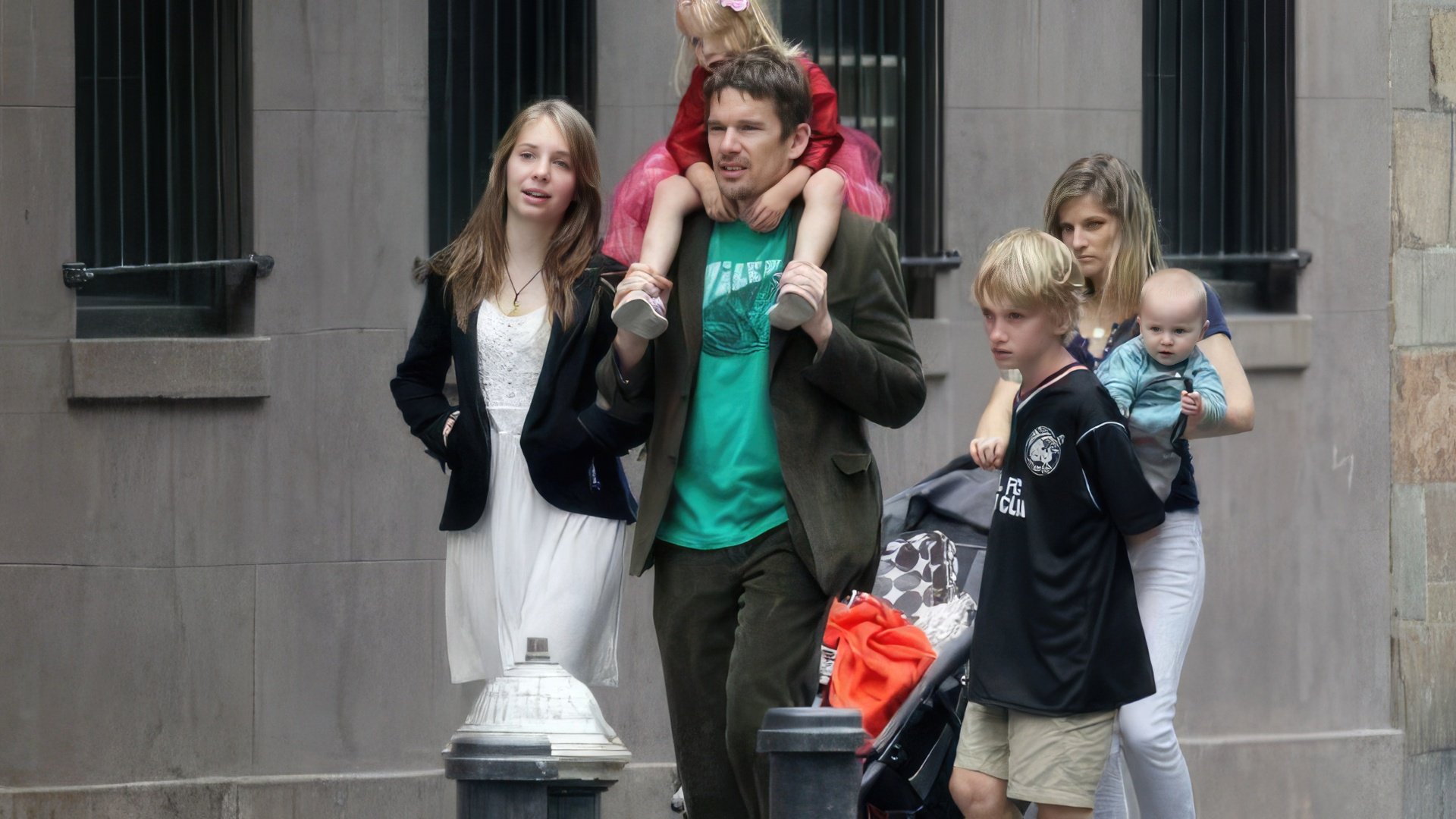 On the photo: Ethan Hawke, his children, and his new wife