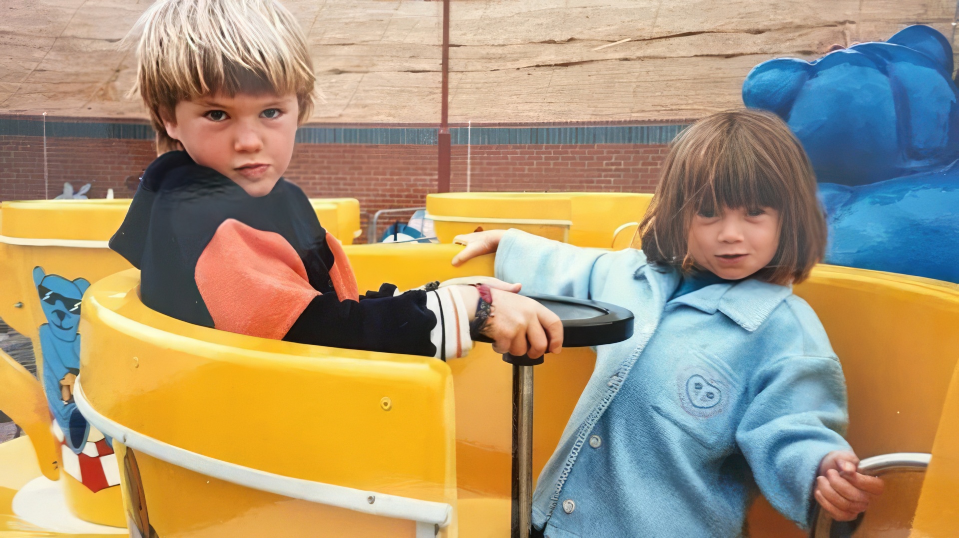 Young Bonnie Wright with her brother