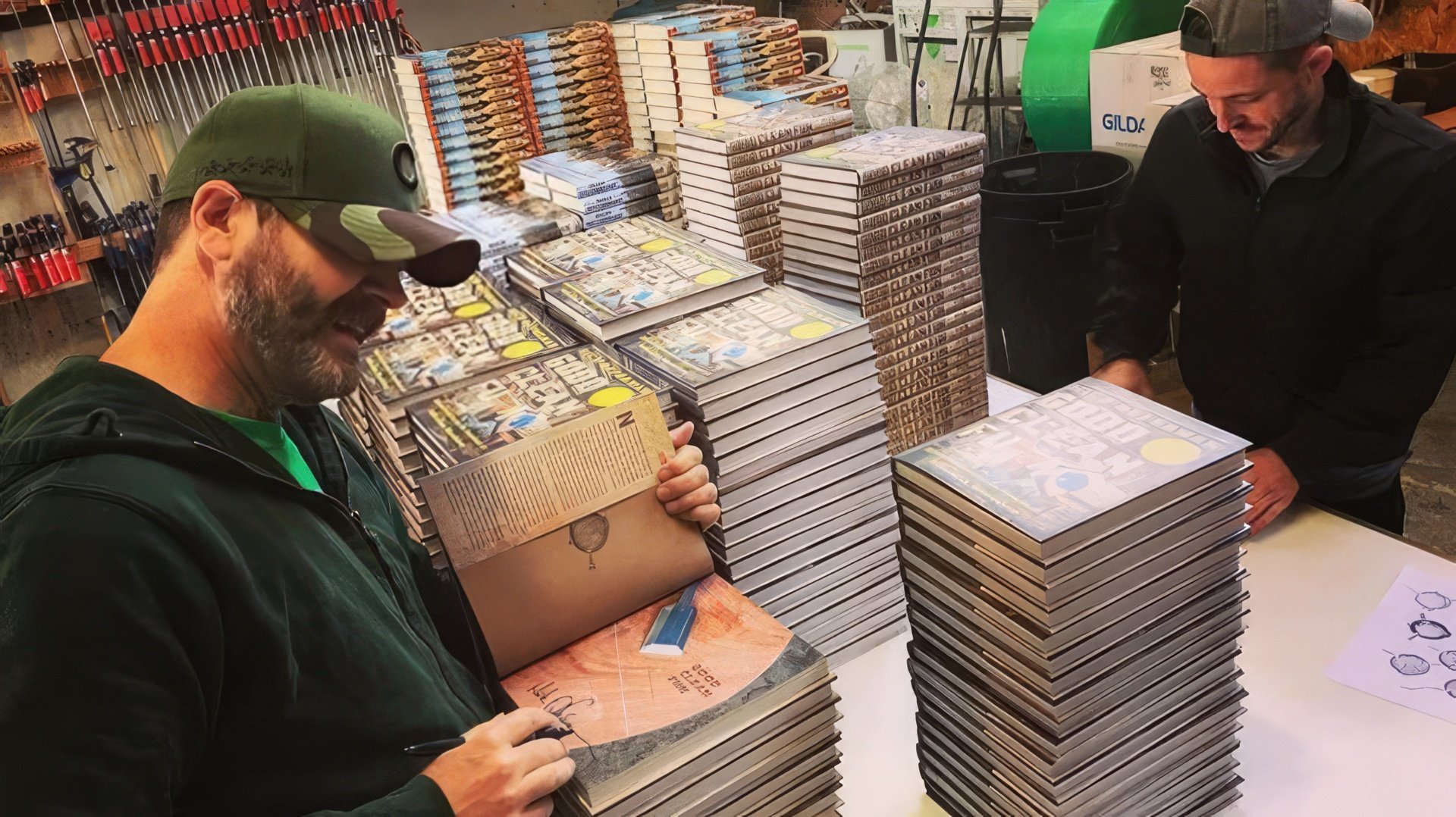 Nick Offerman signing his books