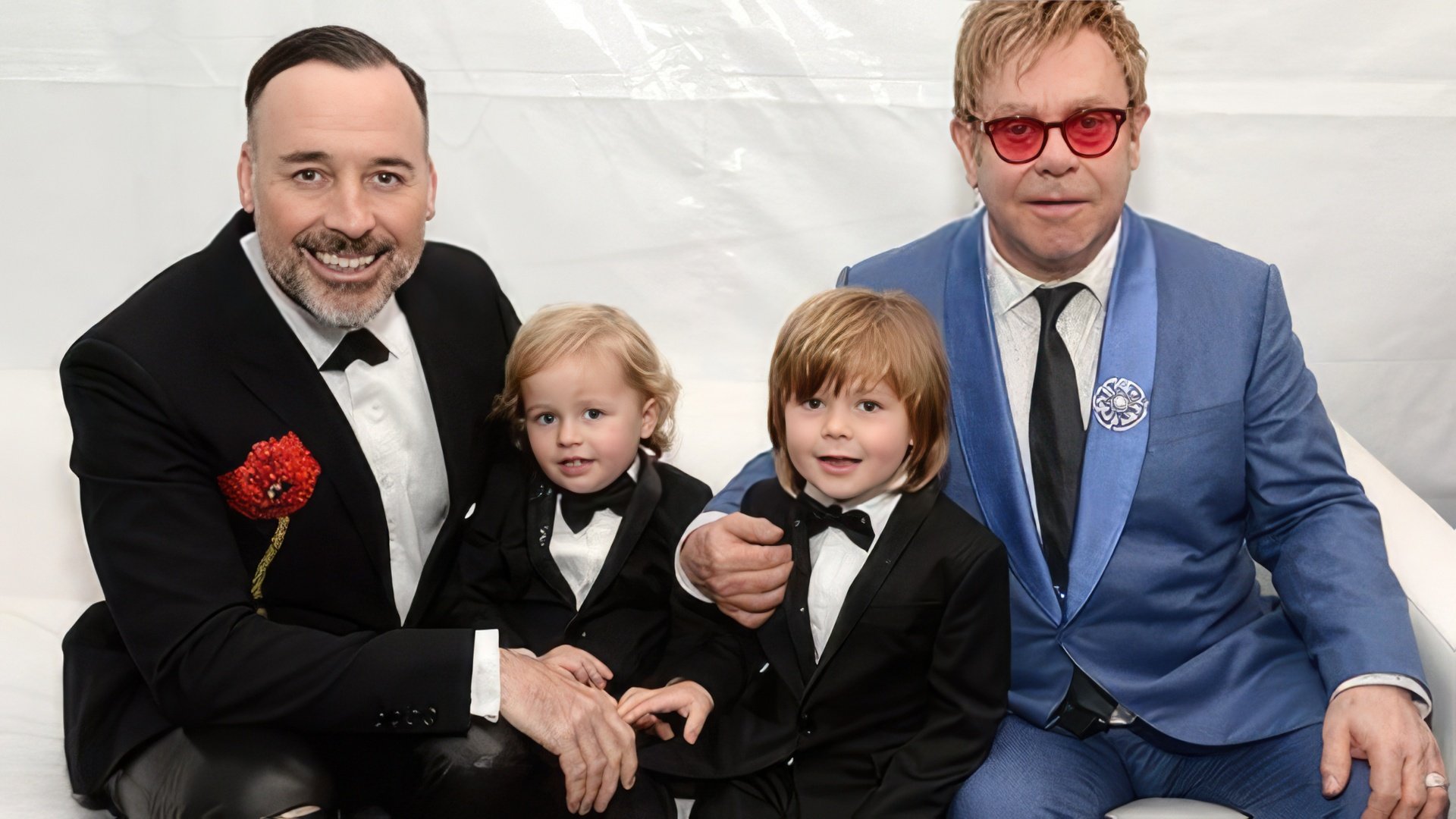 Elton John and David Furnish with children