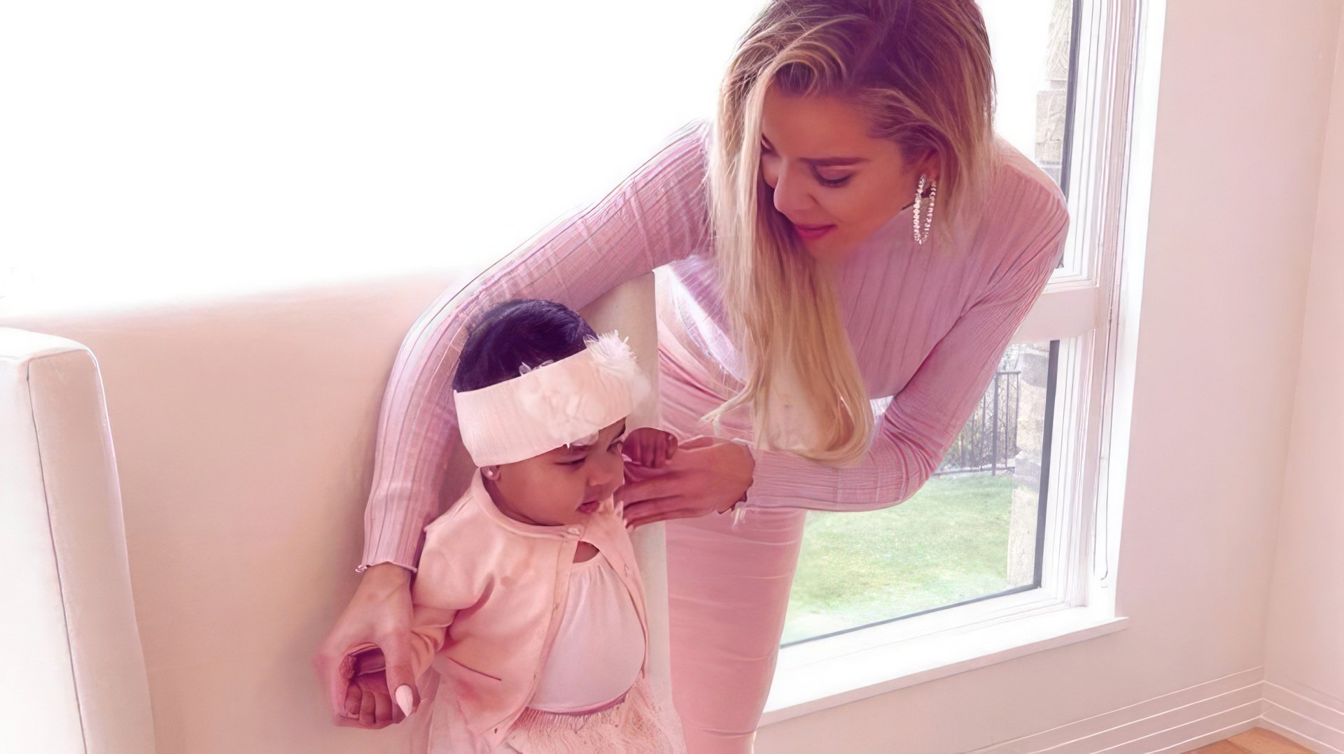 Khloé Kardashian with her baby daughter