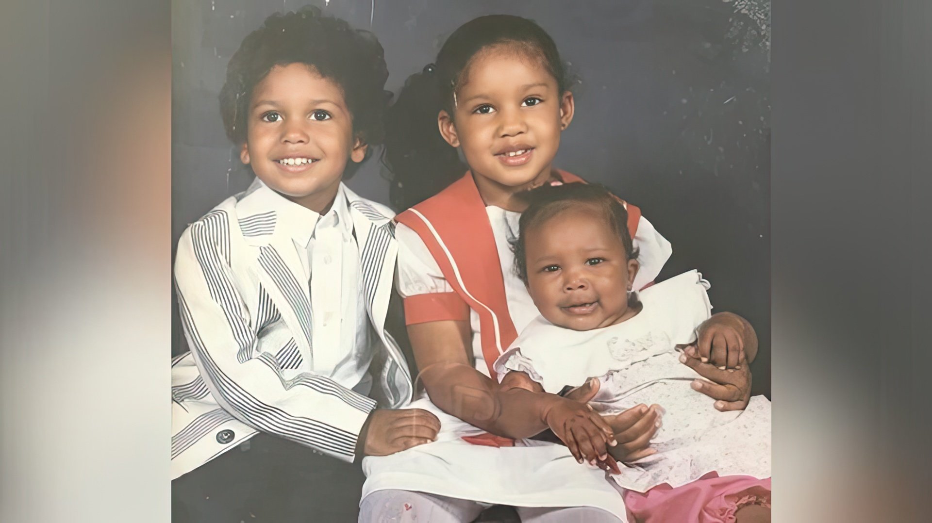 Lizzo (right) as a child with her brother and sister